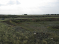 Shlyakh site, looking west from edge of quarry (photo by J.F. Hoffecker).