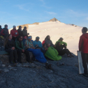 Billy Armstrong discusses ogive formation with students on the Juneau Icefield Research Program. Aug 2016.