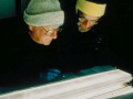 Mark Meier and Richard Alley study an ice core from GISP2 (note the annual dust layers visible in the core segment) at the National Ice Core Laboratory (NICL). Mark was the first Director of NICL. Photo by Ken Abbott, CU Office of Public Relations, Boulder.