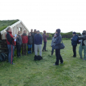 At a farm location near the study site, Viðar Hreinsson of the Reykjavik Academy gives an outdoor lecture on the use of farm buildings in times past. Photo by Astrid Ogilvie, August 2014.