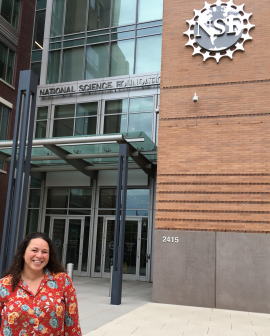 Holly Barnard in front of the NSF building on her last day of work there