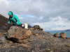 Collecting boulder samples for 10Be dating on Cumberland Peninsula, Baffin Island. Photo credit: Jason Briner