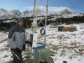 NWT researcher Dominik Schneider downloads automated snow depth measurements at 1 of 3 sites along an elevational transect that monitor snow accumulation and ablation patterns in subapline and alpine environments. Niwot Ridge, CO, Winter 2012. Photo: Leah Meromy.