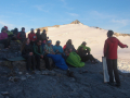 Billy Armstrong discusses ogive formation with students on the Juneau Icefield Research Program. Aug 2016.