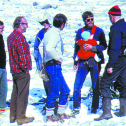 Mark Meier (in plaid shirt) and fellow glaciologists (including Bob Krimmel, holding child) on Glacier Peyto in the Canadian Rockies. Photo by Vladimir Kotlyakov, 1977.