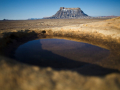 Water-filled pothole near Caineville, Utah