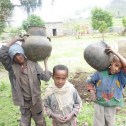 Students with clay pots at the pilot site in Atebes. Photo by Tsegay Wolde-Georgis, July 2010.